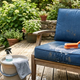 How Do You Clean Outdoor Cushions Without Removable Covers?